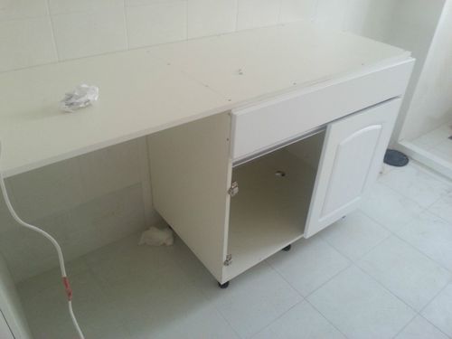 乾龙装饰样板房解析 砌砖厨柜与三房两厅的实用美学